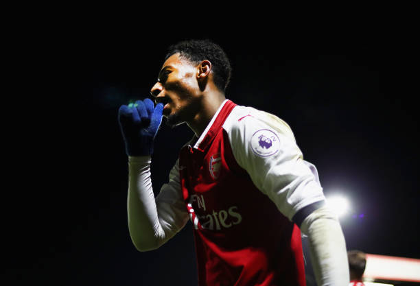 BOREHAMWOOD, ENGLAND - JANUARY 23: Jeff Reine-Adelaide of Arsenal celebrates after scoring his sides fourth goal during the Premier League International Cup match between Arsenal and Bayern Munich at Meadow Park on January 23, 2018 in Borehamwood, England. (Photo by Naomi Baker/Getty Images)