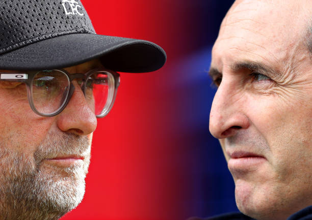 In this composite image a comparison has been made between Jurgen Klopp, Manager of Liverpool (L) and Unai Emery, Manager of Arsenal. Liverpool FC and Arsenal FC meet in the Premier League on August 24,2019 at Anfield in Liverpool,England. ***LEFT IMAGE*** SOUTHAMPTON, ENGLAND - AUGUST 17: Jurgen Klopp, Manager of Liverpool looks on prior to the Premier League match between Southampton FC and Liverpool FC at St Mary's Stadium on August 17, 2019 in Southampton, United Kingdom. (Photo by Catherine Ivill/Getty Images) ***RIGHT IMAGE*** LIVERPOOL, ENGLAND - APRIL 07: Unai Emery, Manager of Arsenal looks on prior to the Premier League match between Everton FC and Arsenal FC at Goodison Park on April 07, 2019 in Liverpool, United Kingdom. (Photo by Clive Brunskill/Getty Images)