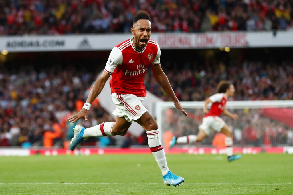 LONDON, ENGLAND - SEPTEMBER 22: Pierre-Emerick Aubameyang of Arsenal celebrates scoring his team's third goal during the Premier League match between Arsenal FC and Aston Villa at Emirates Stadium on September 22, 2019, in London, United Kingdom. (Photo by Michael Steele/Getty Images)