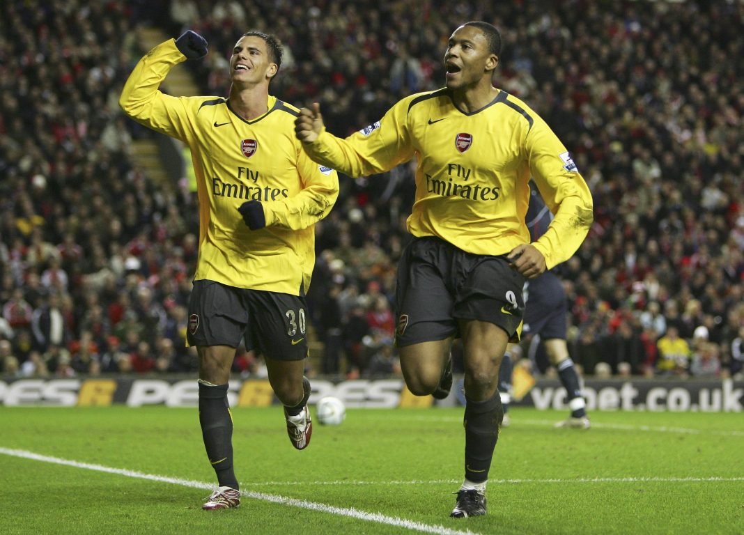 LIVERPOOL, UNITED KINGDOM - JANUARY 09: Julio Baptista (R) of Arsenal celebrates scoring his team's fifth goal to complete his hat trick with team mate Jeremie Aliadiere during the Carling Cup quarter final match between Liverpool and Arsenal at Anfield on January 9, 2007, in Liverpool, England. (Photo by Alex Livesey/Getty Images)