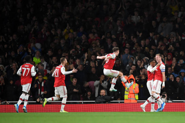 LONDON, ENGLAND - SEPTEMBER 24: Rob Holding of Arsenal celebrates scoring his teams second goal of the game with team mates during the Carabao Cup Third Round match between Arsenal FC and Nottingham Forrest at Emirates Stadium on September 24, 2019 in London, England. (Photo by Laurence Griffiths/Getty Images)