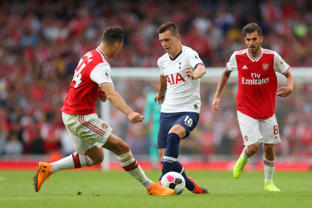 LONDON, ENGLAND - SEPTEMBER 01: Giovani Lo Celso of Tottenham Hotspur is challenged by Granit Xhaka of Arsenal during the Premier League match between Arsenal FC and Tottenham Hotspur at Emirates Stadium on September 01, 2019 in London, United Kingdom. (Photo by Catherine Ivill/Getty Images)