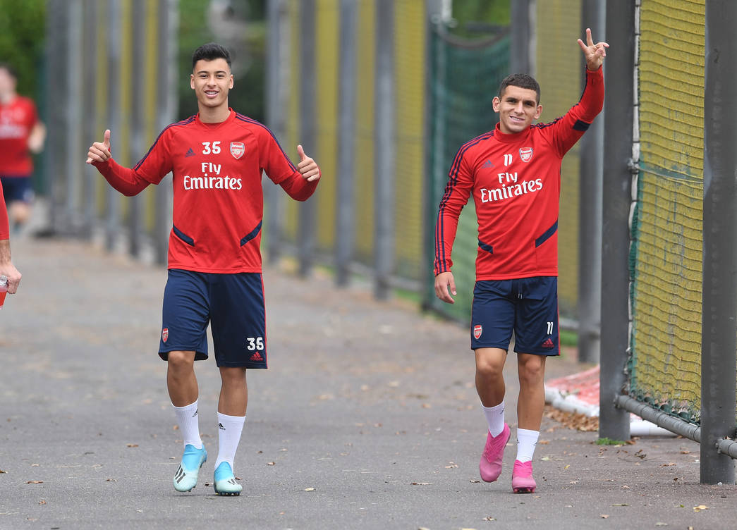 ST ALBANS, ENGLAND - SEPTEMBER 12: Gabriel Martinelli and Lucas Torreira of Arsenal during the Arsenal Training Session at London Colney on September 12, 2019 in St Albans, England. (Photo by David Price/Arsenal FC via Getty Images)