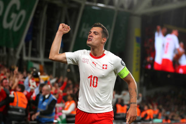 DUBLIN, IRELAND - SEPTEMBER 05: Granit Xhaka of Switzerland celebrates the goal of Fabian Schar during the UEFA Euro 2020 qualifier between Republic of Ireland and Switzerland at Aviva Stadium on September 05, 2019 in Dublin, Ireland. (Photo by Catherine Ivill/Getty Images)
