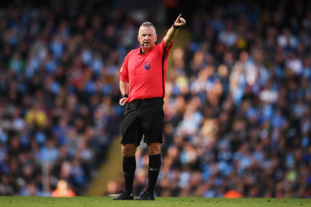 MANCHESTER, ENGLAND - AUGUST 31: Referee Jonathan Moss reacts during the Premier League match between Manchester City and Brighton & Hove Albion at Etihad Stadium on August 31, 2019 in Manchester, United Kingdom. (Photo by Laurence Griffiths/Getty Images)