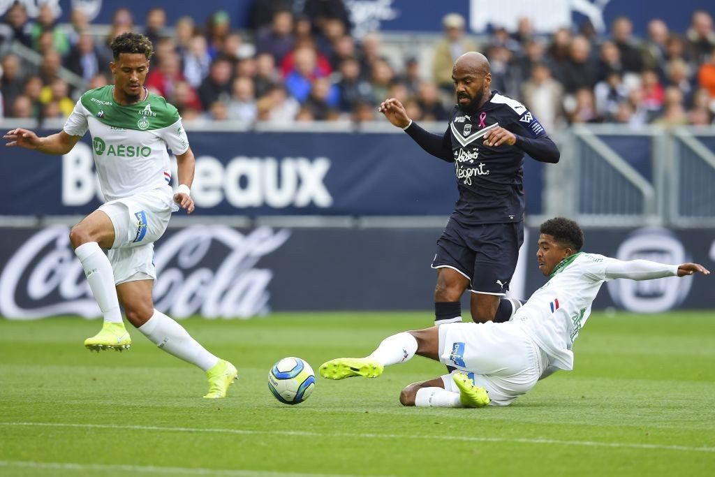 Bordeaux's French forward Jimmy Briand (C) vies with Saint-Etienne's French defender William Saliba (L) and Saint-Etienne's French defender Wesley Fofana (R) during the French L1 football match between Bordeaux and Saint-Etienne (ASSE) on October 20, 2019, at the Matmut Atlantique stadium in Bordeaux, southwestern France. (Photo by NICOLAS TUCAT / AFP / Getty Images)