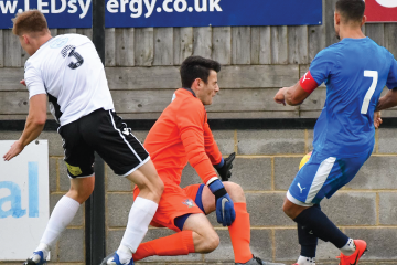 Smith injured himself in the process of making this save, which proved to be his last action for Salisbury (Photo via SalisburyFC / Roger Elliott)