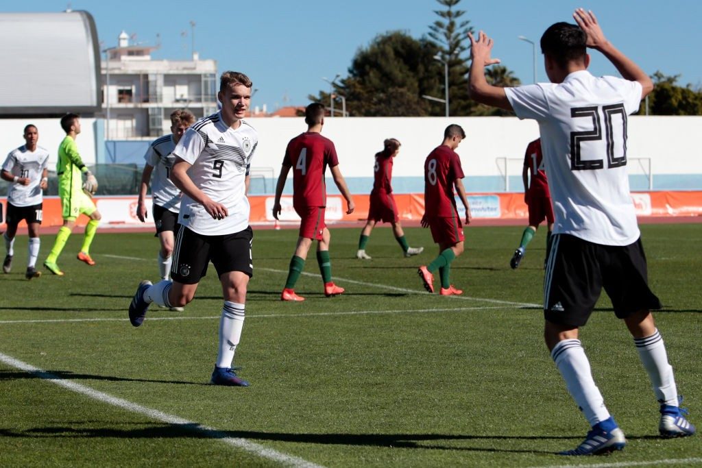 VILA REAL SANTO ANTONIO, PORTUGAL - FEBRUARY 11: Lasse Gunther (L) and Marlon Roos Trujillo (R) of Germany U16 celebrate after Lasse Gunther scores a goal during UEFA Development Tournament match between U16 Germany and U16 Portugal at VRSA Stadium on February 11, 2019 in Vila Real Santo Antonio, Portugal. (Photo by Ricardo Nascimento/Getty Images)