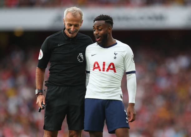 LONDON, ENGLAND - SEPTEMBER 01: Danny Rose of Tottenham Hotspur speaks with referee Martin Atkinson during the Premier League match between Arsenal FC and Tottenham Hotspur at Emirates Stadium on September 01, 2019 in London, United Kingdom. (Photo by Catherine Ivill/Getty Images)