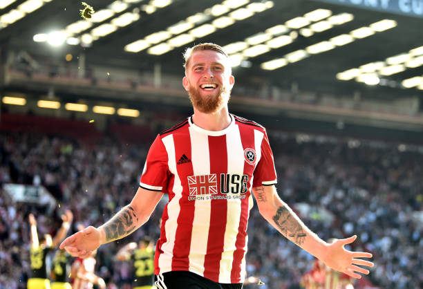 SHEFFIELD, ENGLAND - SEPTEMBER 14: Oliver McBurnie of Sheffield United celebrates after scoring a goal which is then disallowed for offside following a VAR review during the Premier League match between Sheffield United and Southampton FC at Bramall Lane on September 14, 2019 in Sheffield, United Kingdom. (Photo by Nathan Stirk/Getty Images)