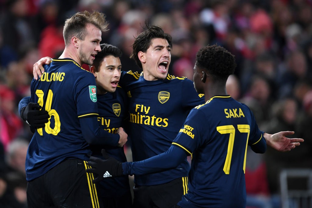 LIVERPOOL, ENGLAND - OCTOBER 30: Gabriel Martinelli of Arsenal celebrates after scoring his team's second goal with Rob Holding, Hector Bellerin and Bukayo Saka of Arsenal during the Carabao Cup Round of 16 match between Liverpool and Arsenal at Anfield on October 30, 2019, in Liverpool, England. (Photo by Laurence Griffiths/Getty Images)