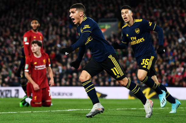 LIVERPOOL, ENGLAND - OCTOBER 30: Lucas Torreira of Arsenal celebrates after scoring his team's first goal during the Carabao Cup Round of 16 match between Liverpool and Arsenal at Anfield on October 30, 2019 in Liverpool, England. (Photo by Laurence Griffiths/Getty Images)