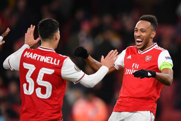 Arsenal's Gabonese striker Pierre-Emerick Aubameyang (R)bcelebrates scoring his team's first goal with Arsenal's Brazilian striker Gabriel Martinelli during their UEFA Europa league Group F football match between Arsenal and Eintracht Frankfurt at the Emirates stadium in London on November 28, 2019. (Photo by DANIEL LEAL-OLIVAS / AFP) (Photo by DANIEL LEAL-OLIVAS/AFP via Getty Images)