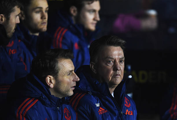 SHREWSBURY, ENGLAND - FEBRUARY 22:  Manchester United coach Albert Stuivenberg (L) and Louis van Gaal manager of Manchester United look on prior to the Emirates FA Cup fifth round match between Shrewsbury Town and Manchester United at Greenhous Meadow on February 22, 2016 in Shrewsbury, England.  (Photo by Laurence Griffiths/Getty Images)