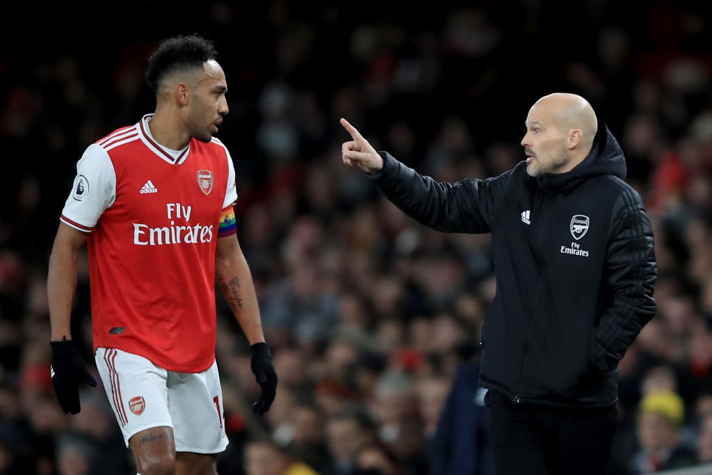 LONDON, ENGLAND - DECEMBER 05: Freddie Ljungberg caretaker Arsenal coach speaks with Pierre-Emerick Aubameyang of Arsenal during the Premier League match between Arsenal FC and Brighton & Hove Albion at Emirates Stadium on December 5, 2019, in London, United Kingdom. (Photo by Marc Atkins/Getty Images)