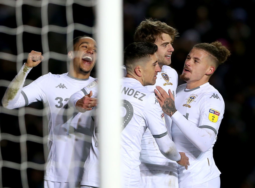 LEEDS, ENGLAND - DECEMBER 14: Patrick Bamford (C) of Leeds United celebrates after scoring the third goal of his team with teammates during the Sky Bet Championship match between Leeds United and Cardiff City at Elland Road on December 14, 2019, in Leeds, England. (Photo by Nigel Roddis/Getty Images)