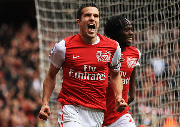 LONDON, ENGLAND - MAY 05: Robin van Persie of Arsenal celebrates scoring their third goal during the Barclays Premier League match between Arsenal and Norwich City at the Emirates Stadium on May 5, 2012 in London, England. (Photo by Bryn Lennon/Getty Images)