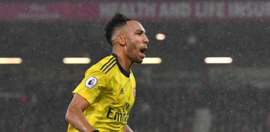 BOURNEMOUTH, ENGLAND - DECEMBER 26: Pierre-Emerick Aubameyang of Arsenal celebrates after scoring his team's first goal during the Premier League match between AFC Bournemouth and Arsenal FC at Vitality Stadium on December 26, 2019 in Bournemouth, United Kingdom. (Photo by Justin Setterfield/Getty Images)