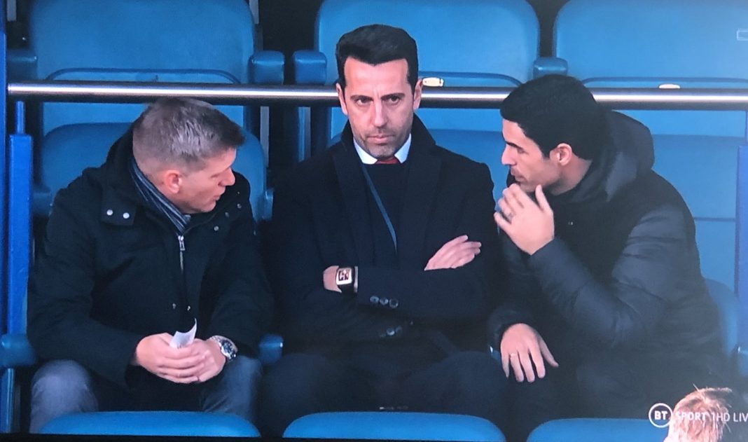 Edu, Mikel Arteta and Steve Round deep in coversation at Goodison Park