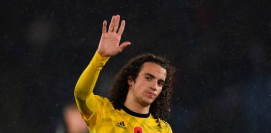 Arsenal's French midfielder Matteo Guendouzi waves to the crowd at the end of the English Premier League football match between Leicester City and Arsenal at King Power Stadium in Leicester, central England on November 9, 2019. (Photo by Oli SCARFF / AFP)