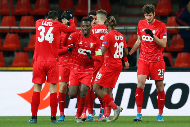 Standard's players celebrate during a soccer match of Belgian team Standard de Liege against English club Arsenal F.C., Thursday 12 December 2019 in Liege, on the sixth and last day of the group stage of the UEFA Europa League, in group F. BELGA PHOTO BRUNO FAHY (Photo by BRUNO FAHY/BELGA MAG/AFP via Getty Images)