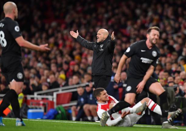 Arsenal's Swedish Interim head coach Freddie Ljungberg (C) reacts as Brighton's English midfielder Dale Stephens (R) fouls Arsenal's Uruguayan midfielder Lucas Torreira (C) during the English Premier League football match between Arsenal and Brighton and Hove Albion at the Emirates Stadium in London on December 5, 2019. (Photo by Ben STANSALL / AFP)