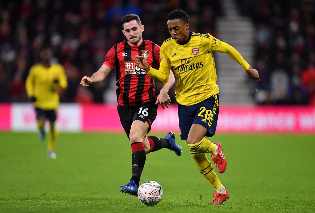 BOURNEMOUTH, ENGLAND - JANUARY 27: Lewis Cook of Bournemouth tackles Joe Willock of Arsenal during the FA Cup Fourth Round match between AFC Bournemouth and Arsenal at Vitality Stadium on January 27, 2020, in Bournemouth, England. (Photo by Justin Setterfield/Getty Images)