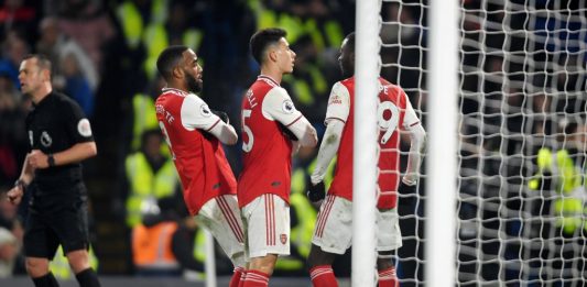 LONDON, ENGLAND - JANUARY 21: Gabriel Martinelli of Arsenal celebrates with his team mates after scoring his team's first goal during the Premier League match between Chelsea FC and Arsenal FC at Stamford Bridge on January 21, 2020, in London, United Kingdom. (Photo by Mike Hewitt/Getty Images)