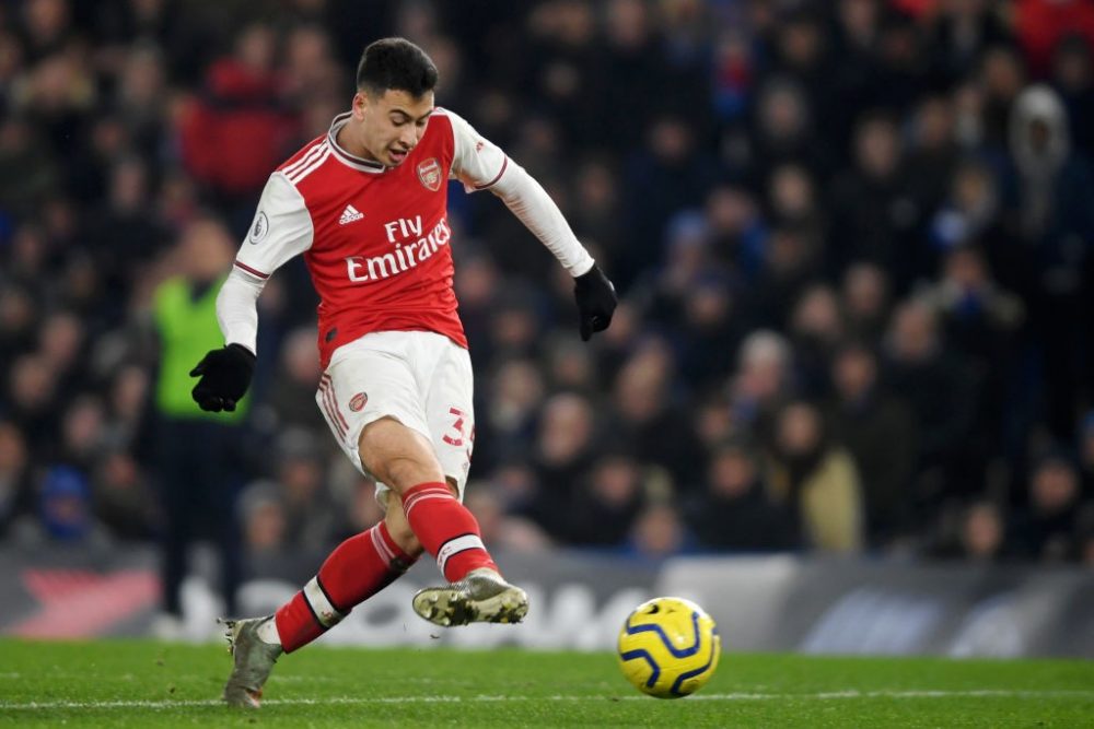 LONDON, ENGLAND - JANUARY 21: Gabriel Martinelli of Arsenal scores his team's first goal during the Premier League match between Chelsea FC and Arsenal FC at Stamford Bridge on January 21, 2020, in London, United Kingdom. (Photo by Mike Hewitt/Getty Images)