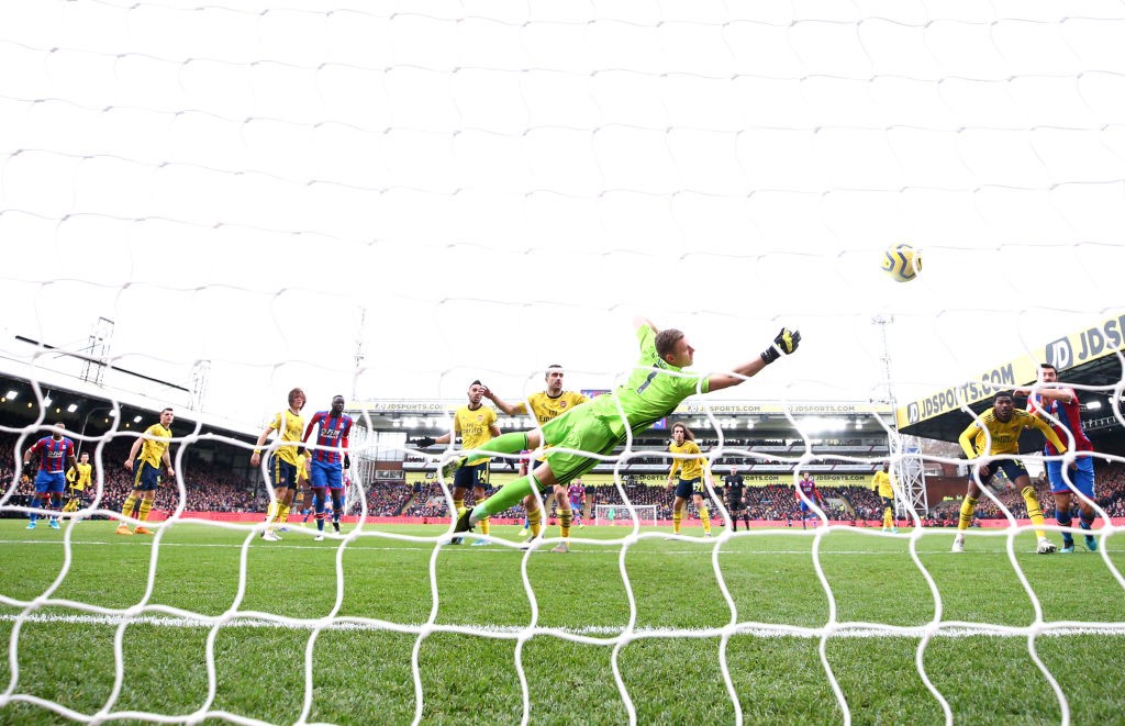 LONDON, ENGLAND - JANUARY 11: Bernd Leno of Arsenal reaches for the ball as Jordan Ayew of Crystal Palace scores his team's first goal during the Premier League match between Crystal Palace and Arsenal FC at Selhurst Park on January 11, 2020, in London, United Kingdom. (Photo by Dan Istitene/Getty Images)