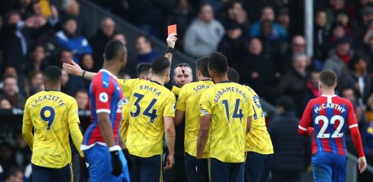 LONDON, ENGLAND - JANUARY 11: Referee Paul Tierney shows a red card to Pierre-Emerick Aubameyang of Arsenal during the Premier League match between Crystal Palace and Arsenal FC at Selhurst Park on January 11, 2020, in London, United Kingdom. (Photo by Dan Istitene/Getty Images)