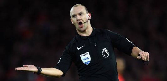 LIVERPOOL, ENGLAND - MARCH 04: Referee Robert Madley gestures during the Premier League match between Liverpool and Arsenal at Anfield on March 4, 2017 in Liverpool, England. (Photo by Laurence Griffiths/Getty Images)