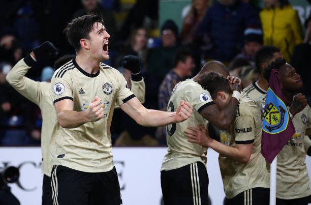 BURNLEY, ENGLAND - DECEMBER 28: Harry Maguire of Manchester United celebrates after team mate Marcus Rashford has scored their second goal during the Premier League match between Burnley FC and Manchester United at Turf Moor on December 28, 2019 in Burnley, United Kingdom. (Photo by Clive Brunskill/Getty Images)