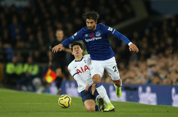 Andre Gomes of Everton is tackled by Son Heung-Min of Tottenham Hotspur during the Premier League match between Everton FC and Tottenham Hotspur at Goodison Park on November 03, 2019 in Liverpool, United Kingdom. 