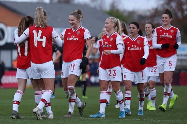 Lisa Evans of Arsenal celerbates with her team mates after scoring her sides ninth during the Barclays FA Women's Super League match between Arsenal and Bristol City at Meadow Park on December 01, 2019 in Borehamwood, United Kingdom.