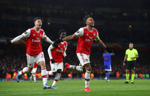 Pierre-Emerick Aubameyang of Arsenal FC celebrates after scoring his team's first goal in extra-time during the UEFA Europa League round of 32 second leg match between Arsenal FC and Olympiacos FC at Emirates Stadium on February 27, 2020 in London, United Kingdom.