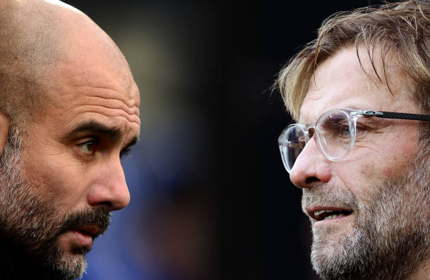 JANUARY 28: Josep Guardiola, Manager of Manchester City looks on prior to The Emirates FA Cup Fourth Round between Cardiff City and Manchester City on January 28, 2018 in Cardiff, United Kingdom. NEWCASTLE UPON TYNE, ENGLAND - OCTOBER 01: Liverpool manager Jurgen Klopp looks on during the Premier League match between Newcastle United and Liverpool at St. James Park on October 1, 2017 in Newcastle upon Tyne, England.