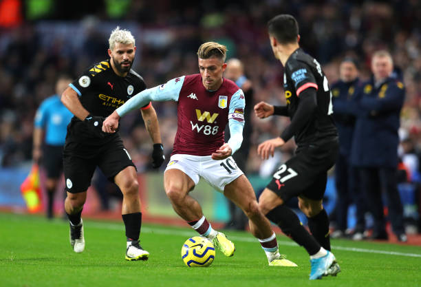 Jack Grealish of Aston Villa takes on Joao Cancelo of Manchester City during the Premier League match between Aston Villa and Manchester City at Villa Park on January 12, 2020 in Birmingham, United Kingdom.