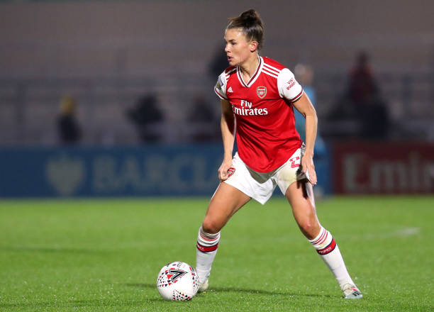 Katrine Veje of Arsenal Women runs with the ball during the UEFA Women's Champions League Round of 16 Second Leg match between Arsenal Women and SK Slavia Praha at Meadow Park on October 31, 2019 in Borehamwood, England. 