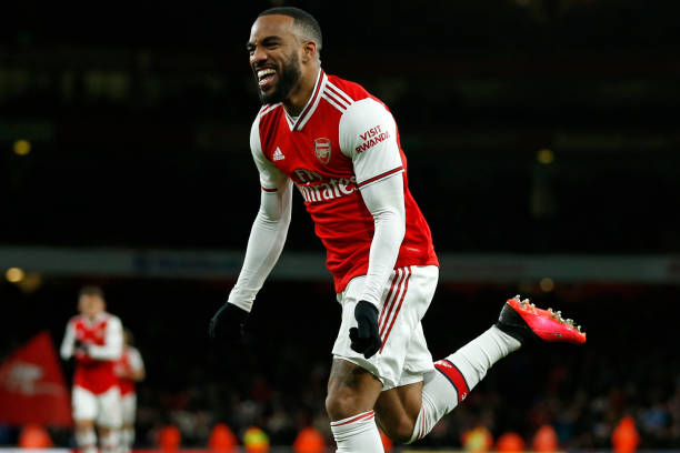 Arsenal's French striker Alexandre Lacazette celebrates after scoring their fourth goal during the English Premier League football match between Arsenal and Newcastle United at the Emirates Stadium in London on February 16, 2020.