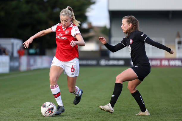 Leah Williamson of Arsenal is challenged by Charlie Wellings of Bristol City Women during the Barclays FA Women's Super League match between Arsenal and Bristol City at Meadow Park on December 01, 2019 in Borehamwood, United Kingdom. 