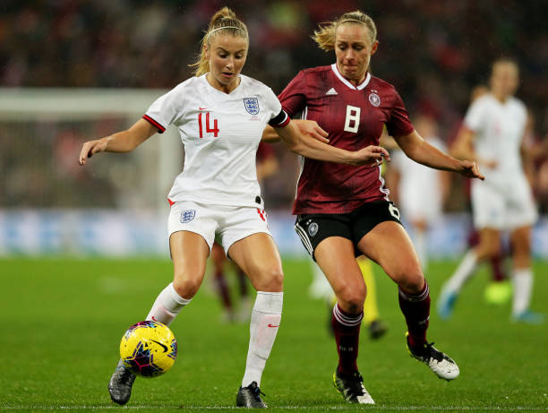 Leah Williamson of England is challenged by Pauline Bremer of Germany during the International Friendly between England Women and Germany Women at Wembley Stadium on November 09, 2019 in London, England. 