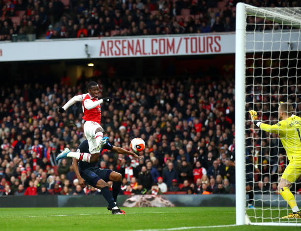 Eddie Nketiah of Arsenal scores his sides first goal during the Premier League match between Arsenal FC and Everton FC at Emirates Stadium on February 23, 2020 in London, United Kingdom.