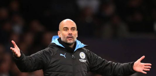 LONDON, ENGLAND - FEBRUARY 02: Pep Guardiola, Manager of Manchester City reatcs during the Premier League match between Tottenham Hotspur and Manchester City at Tottenham Hotspur Stadium on February 02, 2020 in London, United Kingdom. (Photo by Catherine Ivill/Getty Images)