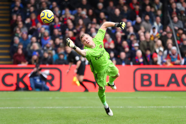 LONDON, ENGLAND - JANUARY 11: Bernd Leno of Arsenal dives for the ball as Jordan Ayew of Crystal Palace (out of frame) scores his team's first goal during the Premier League match between Crystal Palace and Arsenal FC at Selhurst Park on January 11, 2020 in London, United Kingdom. (Photo by Dan Istitene/Getty Images)