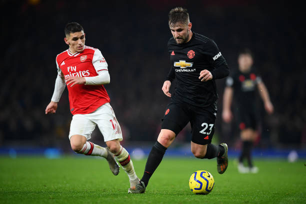 LONDON, ENGLAND - JANUARY 01: Luke Shaw of Manchester United in action during the Premier League match between Arsenal FC and Manchester United at Emirates Stadium on January 01, 2020 in London, United Kingdom. (Photo by Clive Mason/Getty Images)