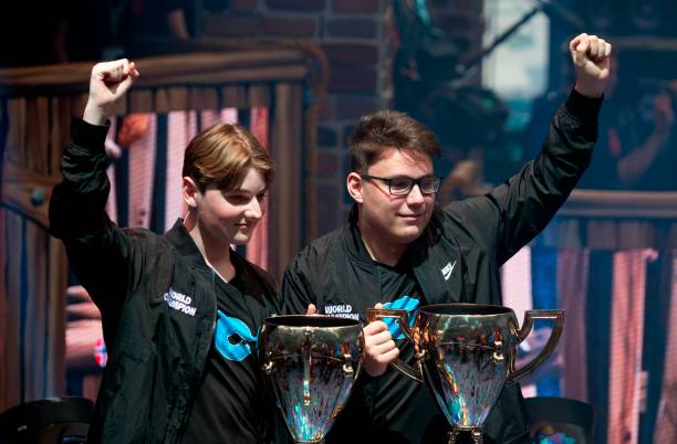 Emil "Nyhrox" Bergquist Pedersen (L) and Thomas "Aqua" Arnould pose with their trophies after winning the Duos competition during the 2019 Fortnite World Cup on July 27, 2019 inside of Arthur Ashe Stadium, in New York City. 