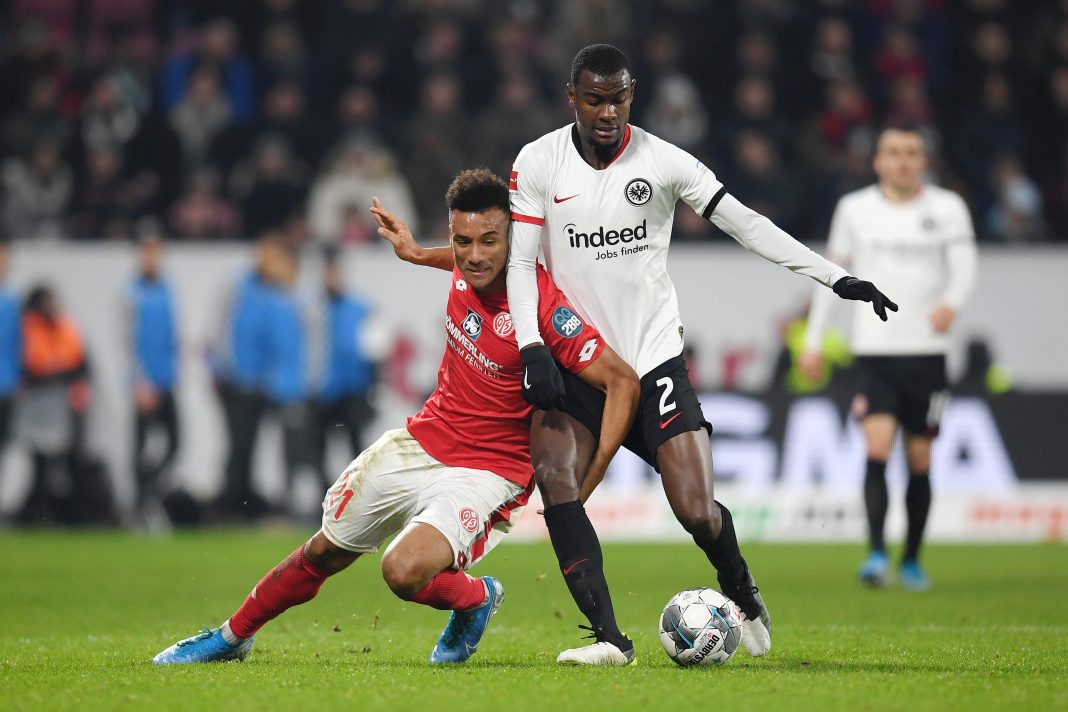 MAINZ, GERMANY - DECEMBER 02: Karim Onisiwo of 1. FSV Mainz 05 battles for possession with Evan Ndicka of Eintracht Frankfurt during the Bundesliga match between 1. FSV Mainz 05 and Eintracht Frankfurt at Opel Arena on December 02, 2019, in Mainz, Germany. (Photo by Matthias Hangst/Bongarts/Getty Images)