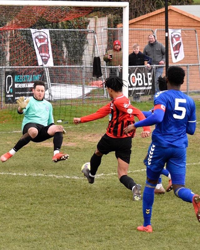 Tyger Smalls scores for Saffron Walden Town against Woodford Town FC (Photo via Instagram)
