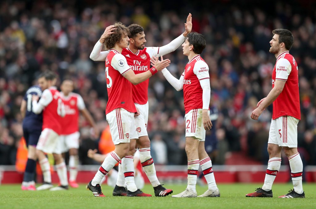 Players of Arsenal celebrate following the Premier League match between Arsenal FC and West Ham United at Emirates Stadium on March 07, 2020 in London, United Kingdom.